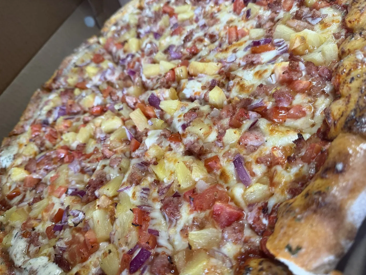 Hawaiian pizza with ham, bacon and pineapple at Nikki's Pizza Windsor